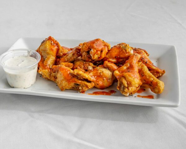Deep-Fried Hot Wings, Pickled Cabbage, and Celery Salad